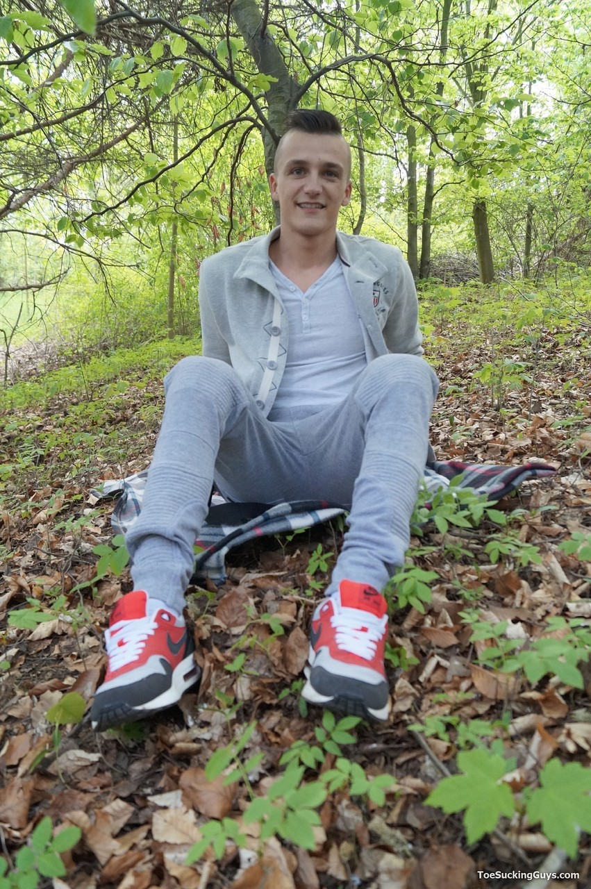 Little twink Dom Ully strips in the forest, masturbates & cums on his feet  