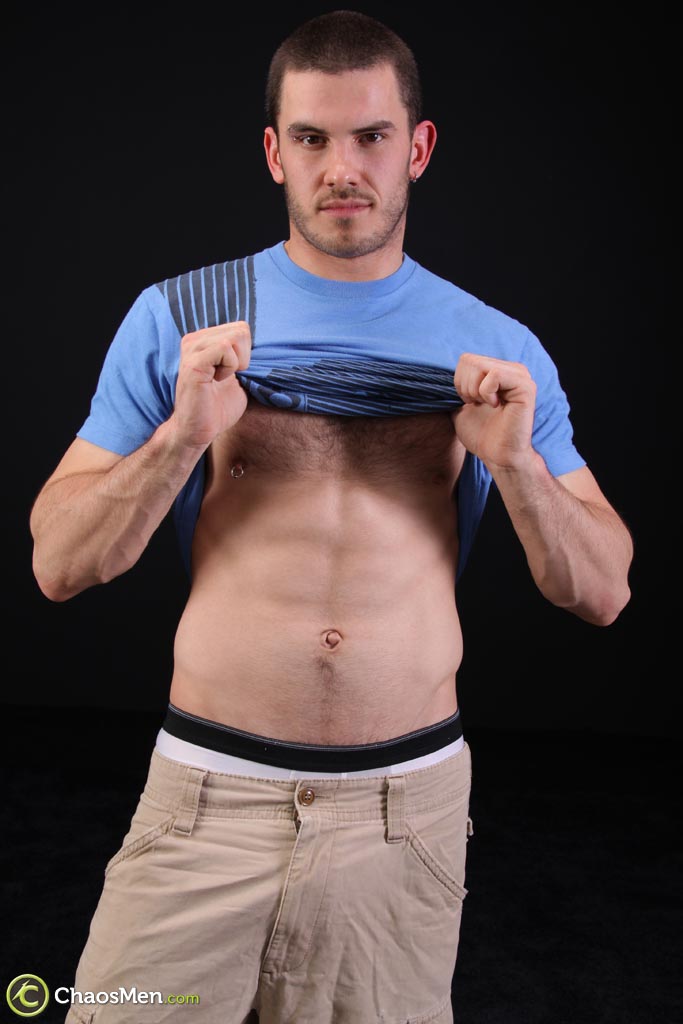 Dark-haired gay model Vander unveils his big hairy dick as he strips  