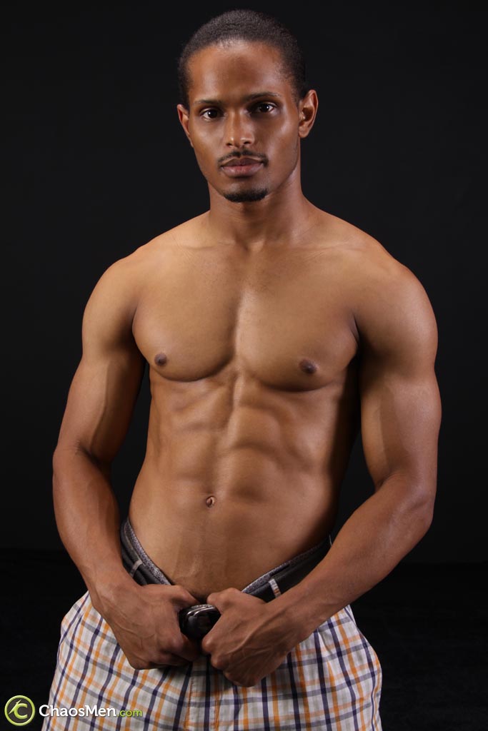 Muscular black gay Felipe shows his abs and big prick in a solo striptease  
