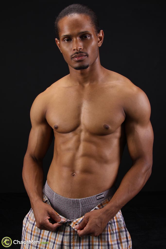 Muscular black gay Felipe shows his abs and big prick in a solo striptease  