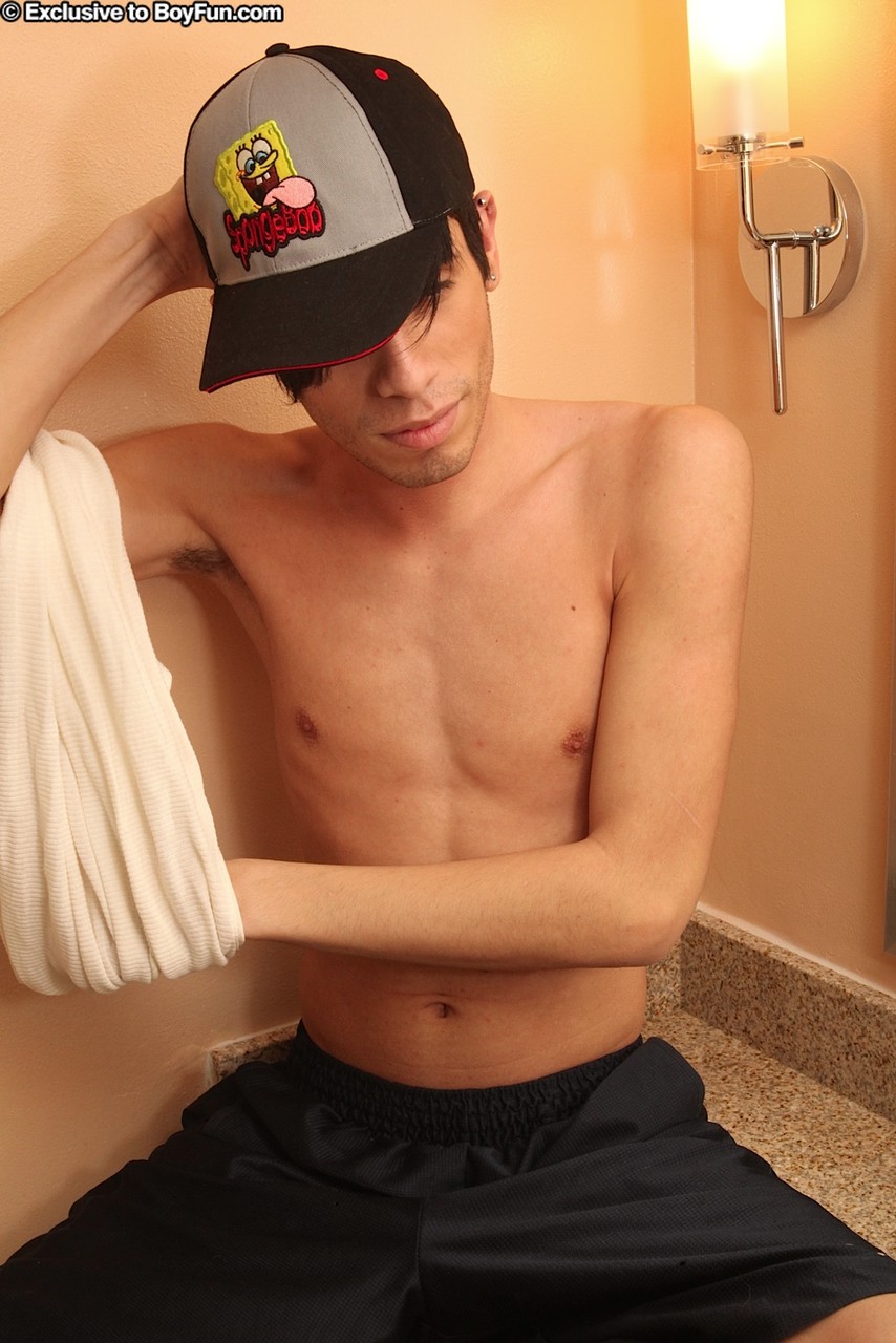Cute ebony gay boy Joey strips, grabs his big dick & jerks off in the bathroom  