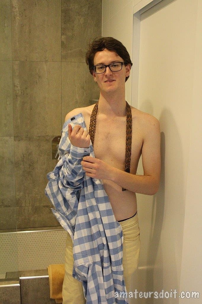 Skinny gay nerd Azz Pump stripping and masturbating in the bathroom  