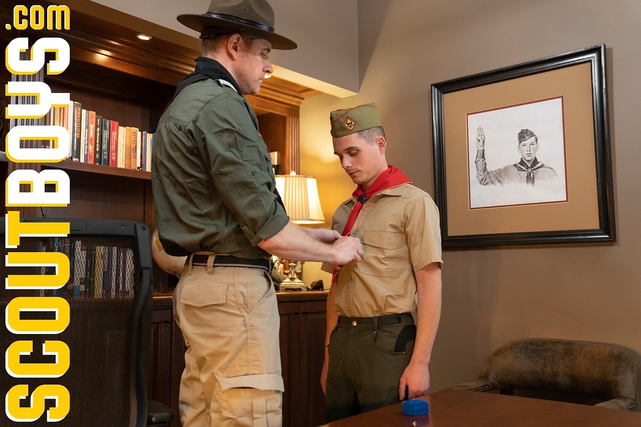 Petite twink Scout Mark kneels and gives Scoutmaster Wolf a BJ before sex  